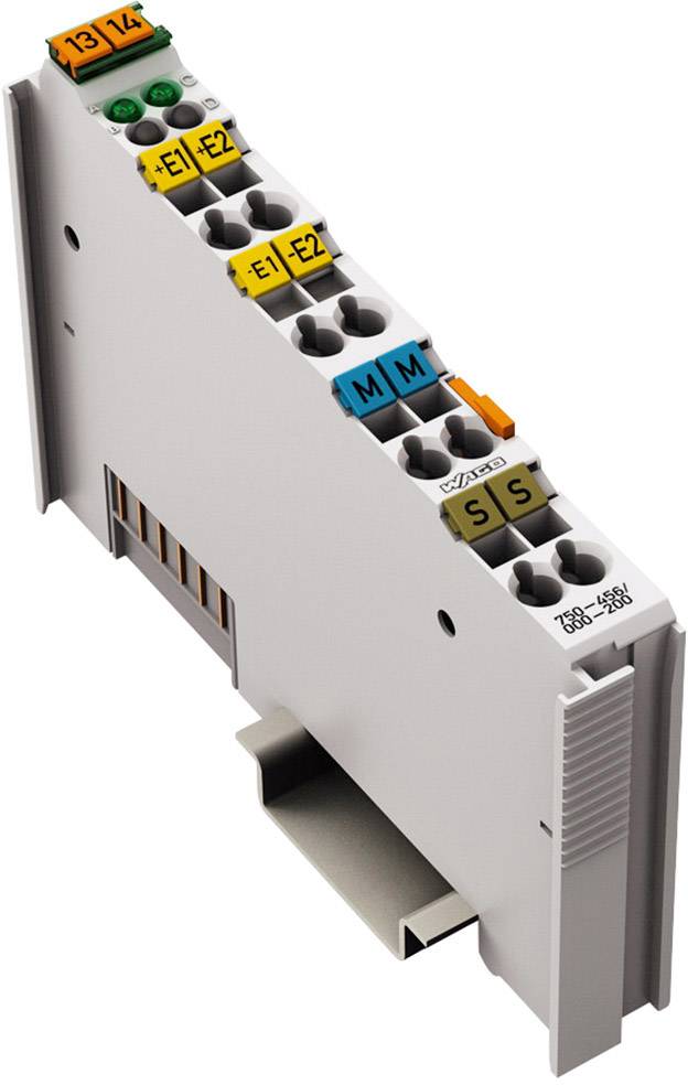 Un module de technologie de commande avec plusieurs connexions marquées par des couleurs et des régulateurs sur une plaque de boîtier grise.