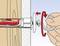 L'illustration montre une main en train de visser une cheville d'ancrage dans un mur. La cheville se dilate dans le matériau pour assurer une fixation stable.