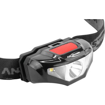 Lampe frontale noire avec interrupteur rouge, bandeau élastique et LED très lumineuse, adaptée aux activités de plein air.