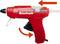Pistolet à colle chaude rouge avec poignée ergonomique et flèches indiquant le processus de collage et le mécanisme de déclenchement.