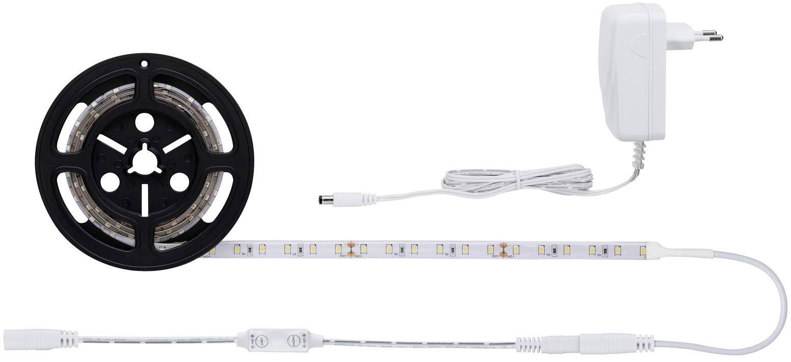 Rouleau avec bande lumineuse à LED, alimentation électrique et connecteur de liaison. La bande présente des LED réparties uniformément et prête à être installée.