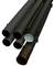 Plusieurs tubes en plastique noir cannelés de différentes tailles empilés côte à côte.