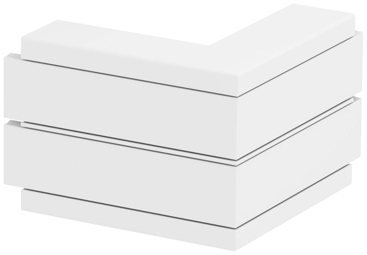 Un bloc blanc, en forme de L, à trois couches.
