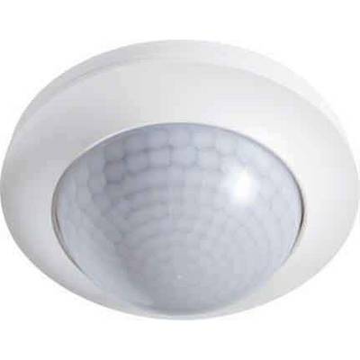 Un détecteur de mouvement de plafond rond en blanc, avec un couvercle semi-sphérique et strié.