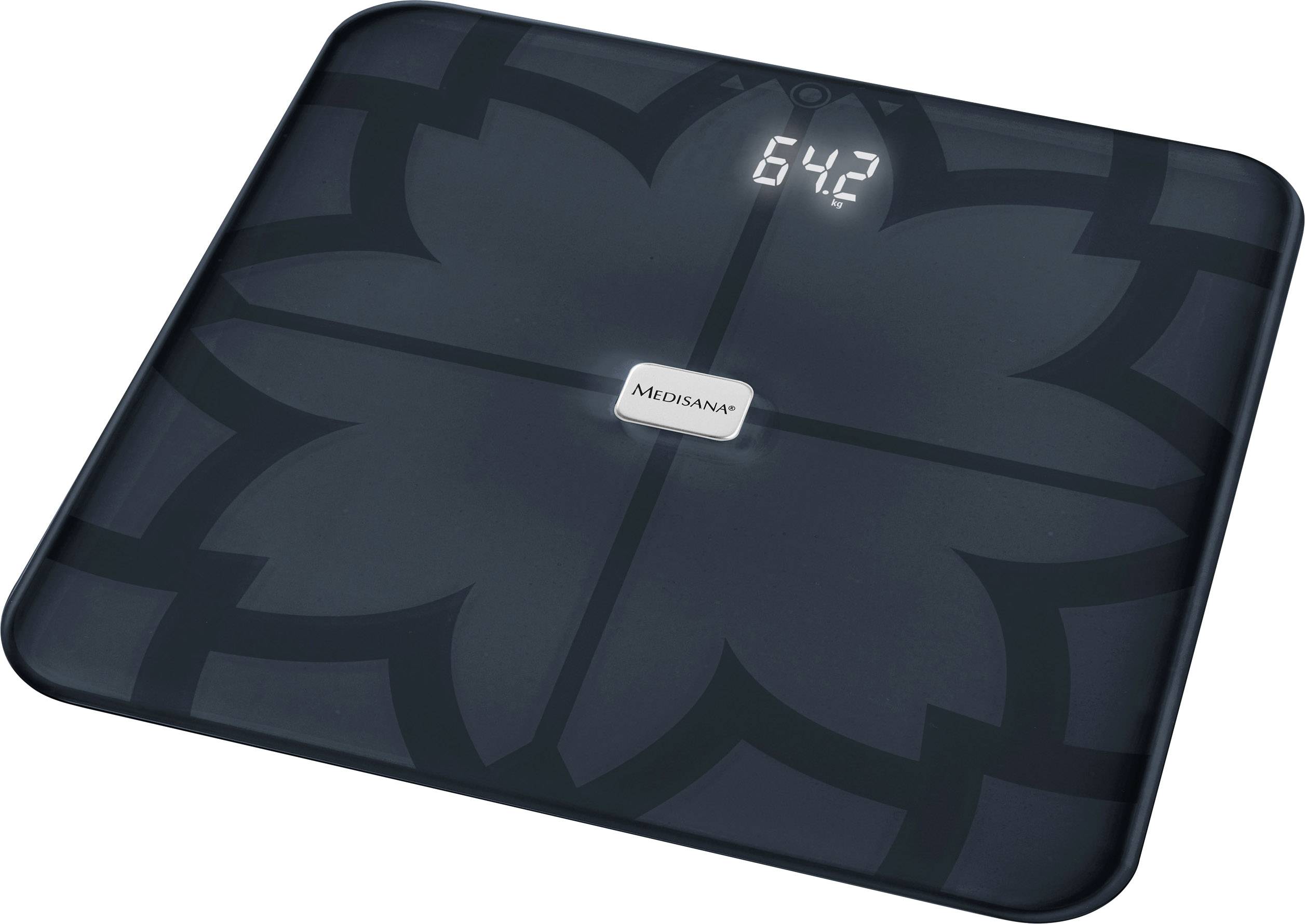 Une balance numérique affiche un poids de 64,2 kg. Le design est moderne avec un motif géométrique au centre de la balance.