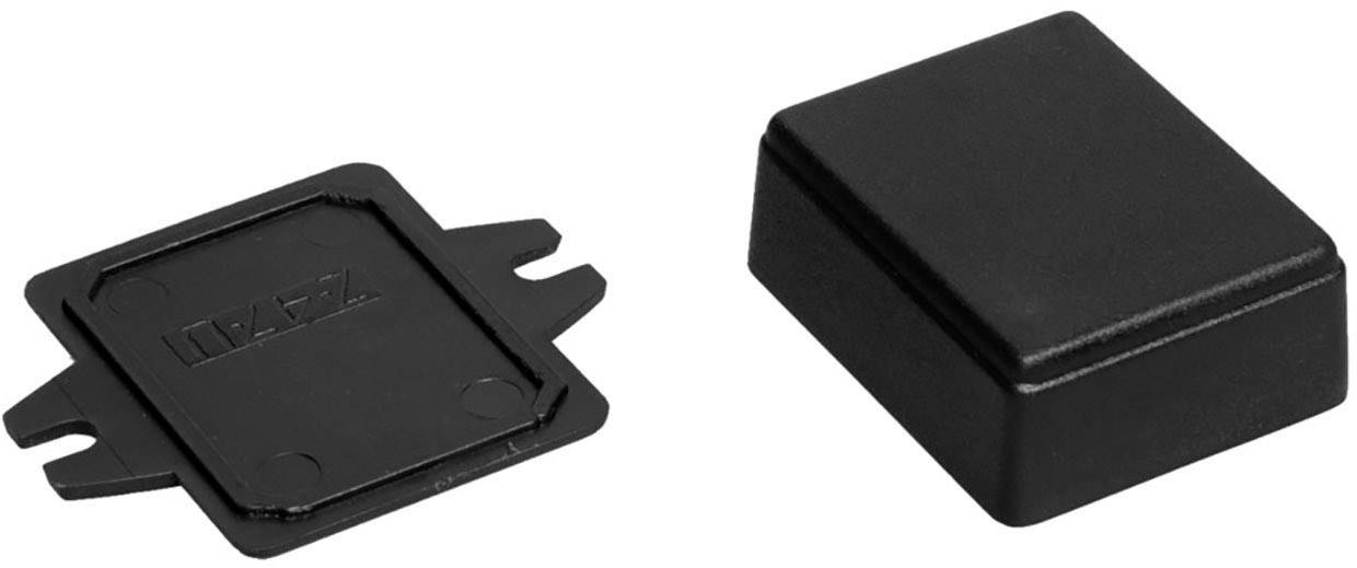 Deux boîtiers en plastique noir, l'un avec un couvercle et l'autre ouvert, sur un fond blanc. Ils sont rectangulaires et plats.