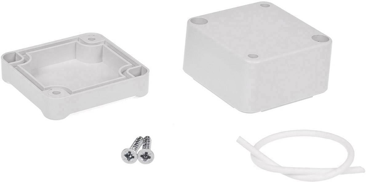 Une boîte de dérivation en plastique grise est composée d'un couvercle, d'une base, de deux vis et d'un joint d'étanchéité.