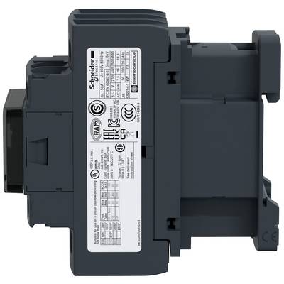 Un interrupteur électrique dans un boîtier gris portant une étiquette du fabricant sur laquelle sont visibles des détails techniques et des certificats de sécurité.