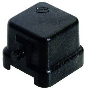 Un boîtier en plastique noir, de forme cubique avec des angles arrondis, sur lequel un petit relief est visible sur un côté.