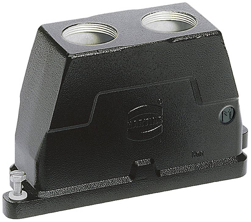 Un boîtier noir et rectangulaire avec deux ouvertures rondes sur le dessus et un marquage sur la face avant.
