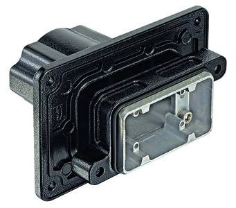 Composant électronique noir rectangulaire avec un cadre métallique et une fixation par vis, probablement un adaptateur ou un connecteur.