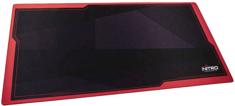 Un tapis de souris gaming rectangulaire noir avec un bord rouge et l'inscription 'Nitro Concepts' dans le coin inférieur droit.