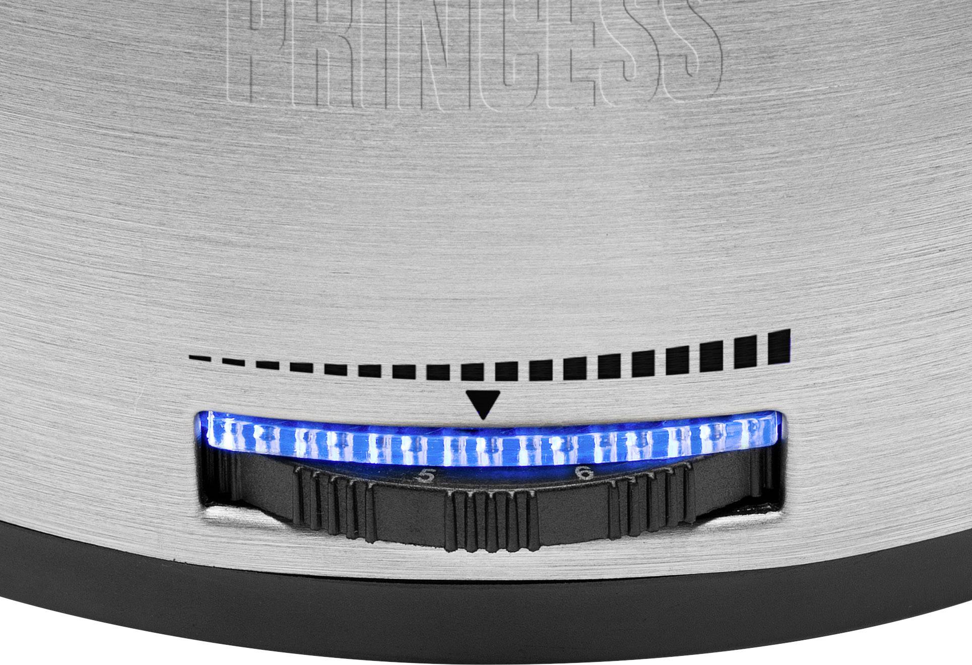 L'image montre un bouton argenté avec un éclairage LED bleu sur un appareil électroménager. L'arrière-plan est en métal brossé.