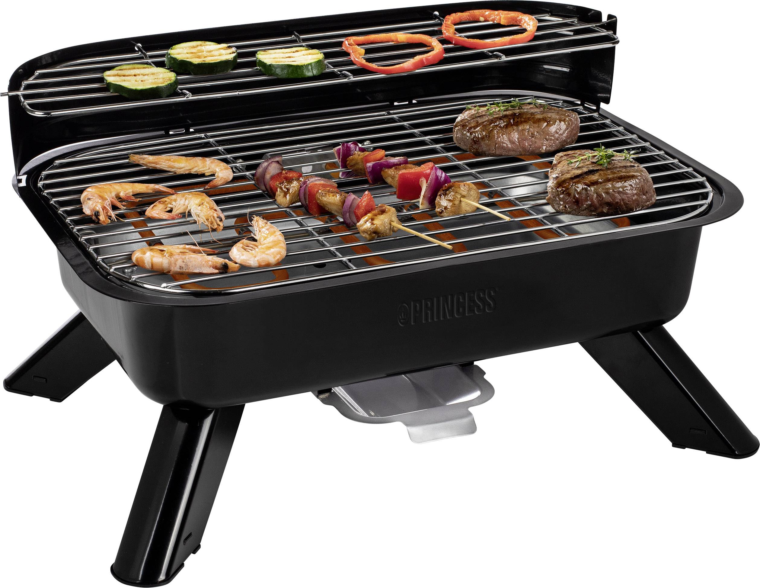 Un grill de table avec de la viande, des crevettes et des légumes comme des courgettes et des poivrons sur la grille. Idéal pour un petit barbecue.