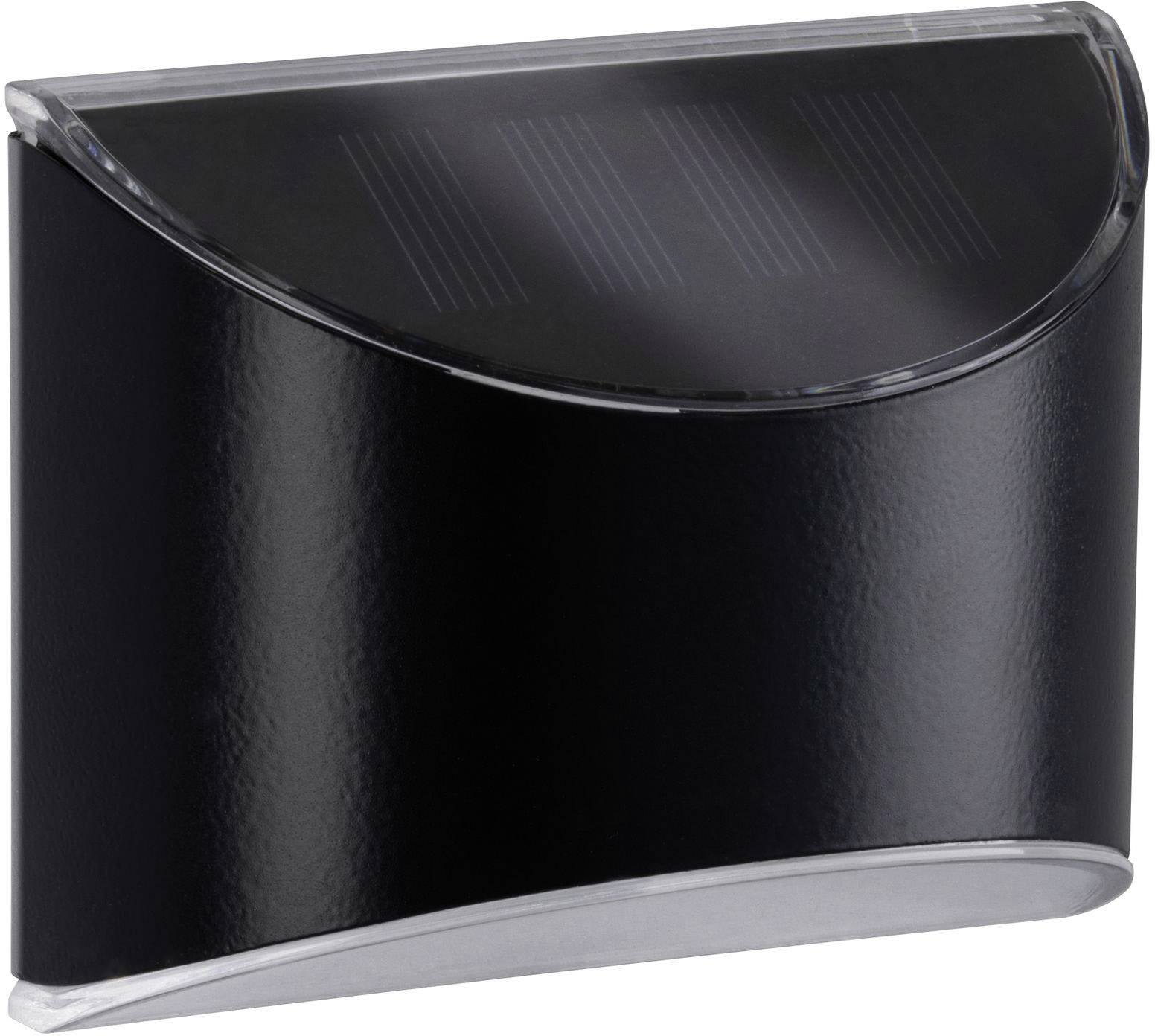 Lumière solaire noire semi-circulaire avec couverture transparente. Contient des panneaux solaires pour la production d'énergie.