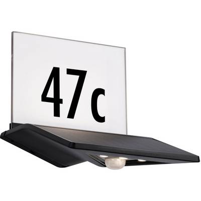 Plaque d'immatriculation portant le numéro '47c' en noir sur fond blanc, fixée à une structure noire avec deux lumières intégrées en dessous.