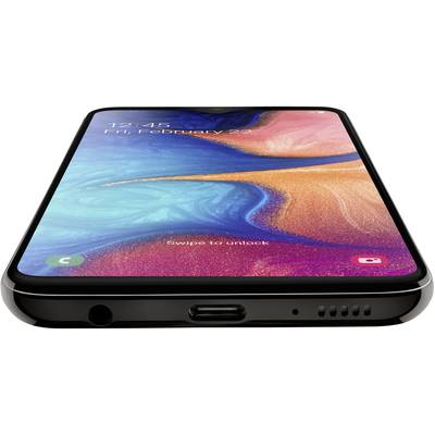 Smartphone avec un écran lumineux et coloré affichant la date et l'heure. Le texte 'Glisser pour déverrouiller' est visible sur l'écran.