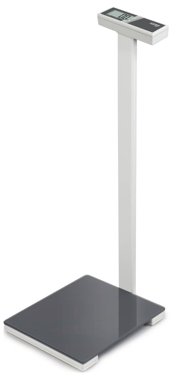 Balance électronique médicale avec affichage numérique sur support élevé, conçue pour des mesures de poids précises dans les établissements de santé.