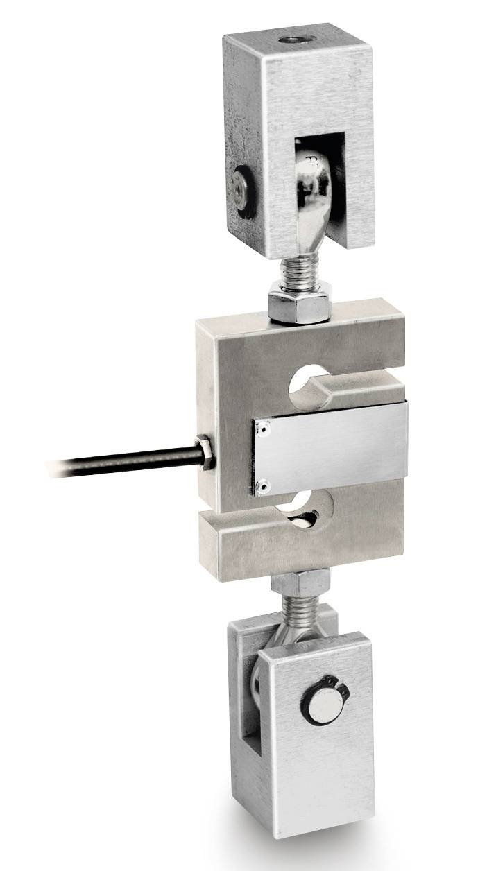 Un capteur de force rectangulaire en métal à deux points de fixation et une connexion de câble, conçu pour mesurer les forces dans les machines.