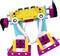 Un robot coloré en briques Lego avec des bras et des jambes, en bleu, jaune et rose, se tient debout. Des composants électroniques sont visibles.