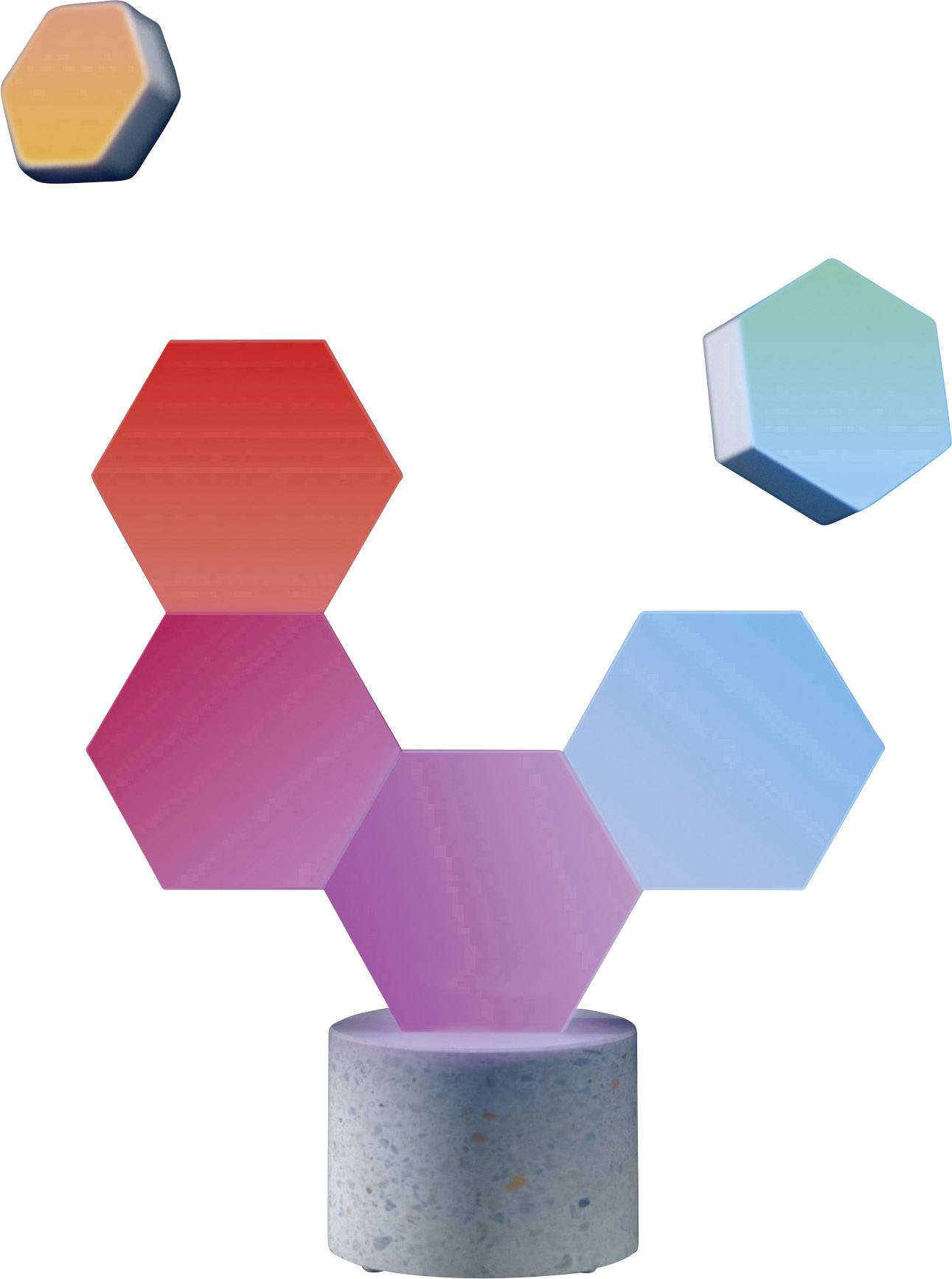 Des modules hexagonaux colorés en rouge, violet et bleu sont disposés sur un cylindre gris, évoquant une œuvre d'art moderne.