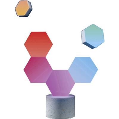 Des formes hexagonales colorées flottent au-dessus d'un socle cylindrique. Les formes sont colorées en rouge, violet et bleu.