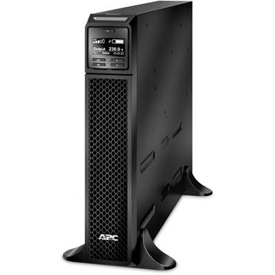Un onduleur (UPS) noir vertical de marque APC avec un affichage numérique à l'avant, indiquant une tension de sortie de 230V.