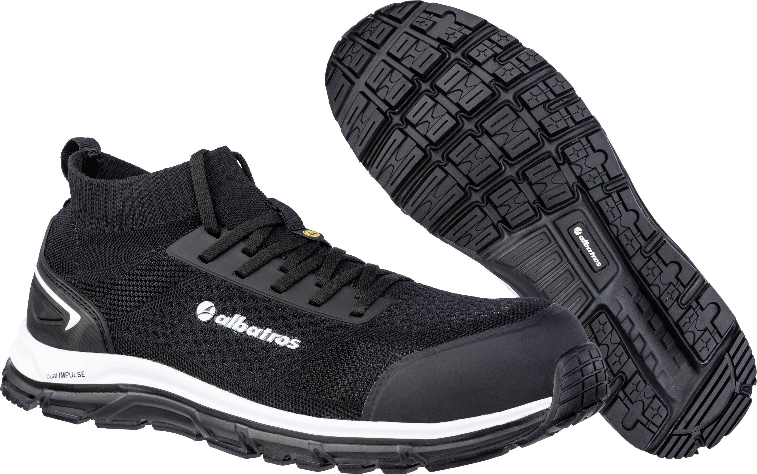 Chaussures de sécurité noires avec semelle antidérapante et tige élastique. Marquées 'albatros' sur le côté. Idéales pour les environnements de travail.