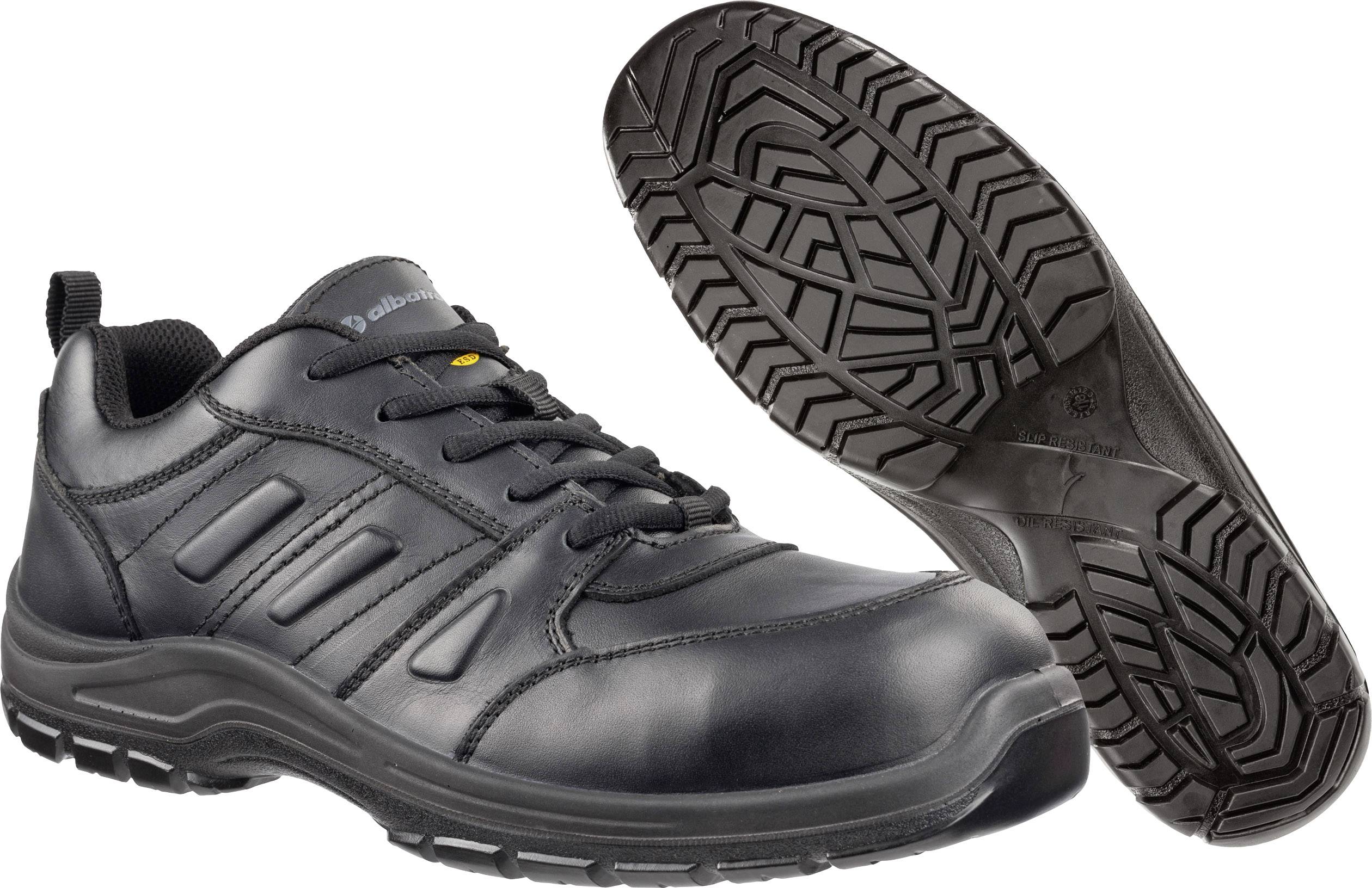 Chaussures de travail noires avec semelle antidérapante et bout renforcé, adaptées à la sécurité sur le lieu de travail.