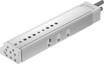 Un actionneur linéaire pneumatique rectangulaire en argent avec plusieurs options de connexion. Adapté aux applications industrielles.