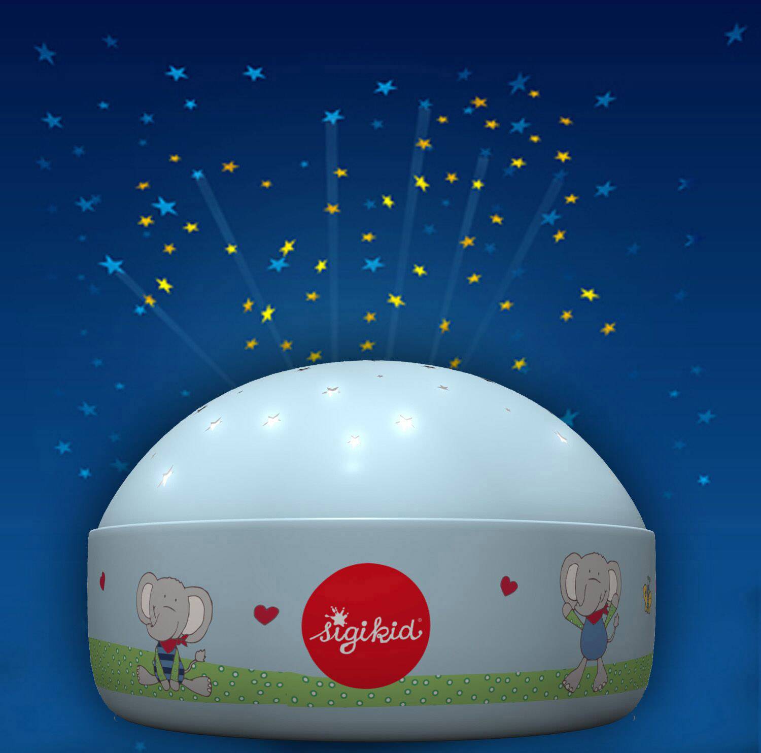 Une veilleuse en forme de demi-sphère projette des étoiles jaunes au plafond. Elle présente un motif d'éléphant et de cœur.