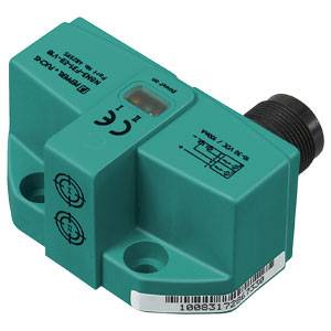 Capteur inductif, rectangulaire, de couleur verte, avec possibilité de connexion et certification CE sur la surface.