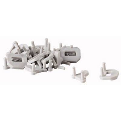 Un groupe de pièces en plastique gris clair et plates avec des broches saillantes sur un fond blanc.
