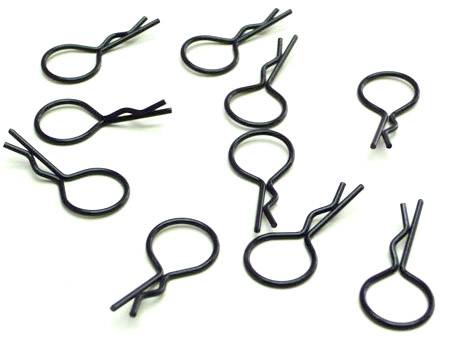 'Dix goupilles de sécurité en métal noir dans différentes orientations.'