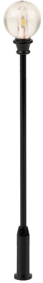 Une longue tige noire avec une ampoule sphérique transparente à son extrémité. L'ampoule présente un filament visible.