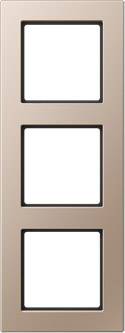 Cadre triple en métal bronze pour interrupteurs ou prises électriques.