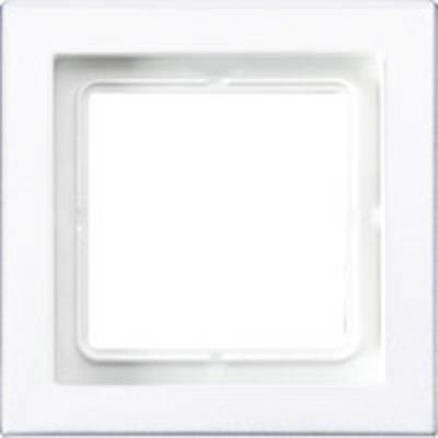 Un cadre carré blanc pour interrupteur, sans interrupteur, monté sur un fond blanc.