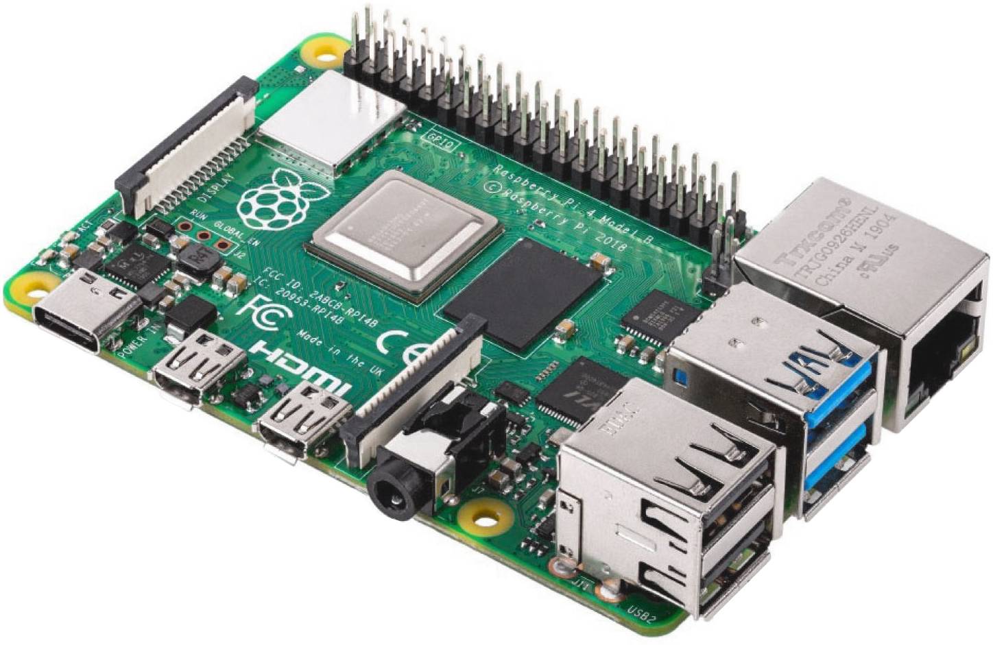 Un ordinateur monocarte Raspberry Pi avec plusieurs ports, incluant USB, HDMI et Ethernet, et un processeur visible.