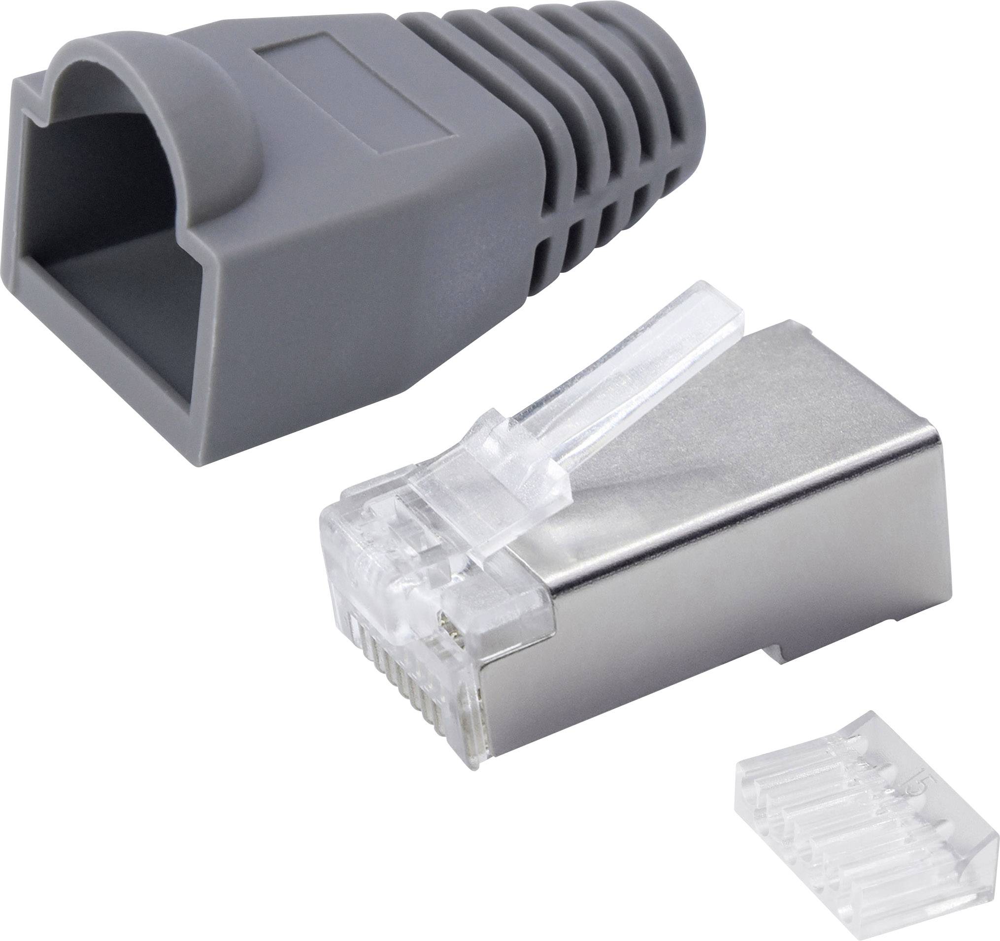 Boîtier et connecteur RJ45 gris avec blindage métallique, à côté d'une pièce en plastique, sur fond blanc.