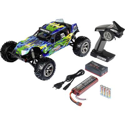 Ensemble de voiture télécommandée avec tout-terrain coloré, télécommande, batterie, chargeur et piles. Prêt pour une utilisation en extérieur.
