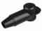 Un composant en plastique noir, probablement un connecteur de bougie d'allumage ou un raccordement électrique, sur un fond blanc.