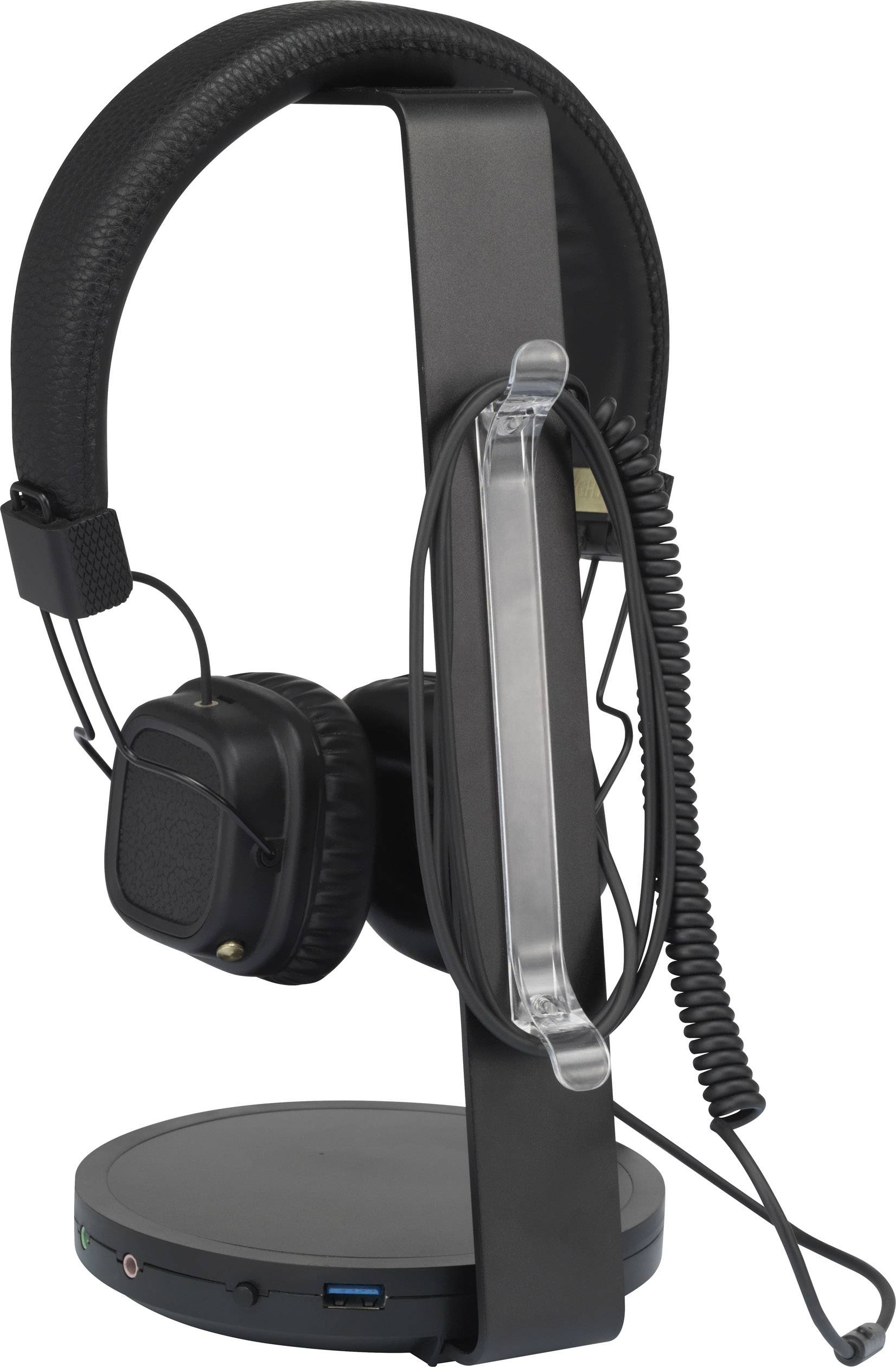 Casque noir sur un support, avec un câble sur le côté. Le support dispose d'un port USB à sa base.