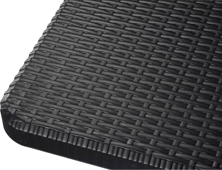 Gros plan sur une surface de rotin structurée, gris foncé, avec un bord rectangulaire. Idéal pour la décoration de meubles.
