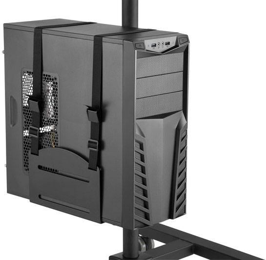 Un boîtier d'ordinateur noir est fixé sur un support mobile. Des ouvertures de ventilation et des ports sont visibles sur la façade.