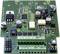 Circuit électronique avec divers composants électroniques, comprenant des condensateurs, des résistances et des circuits intégrés, sur une carte de circuit imprimé verte.