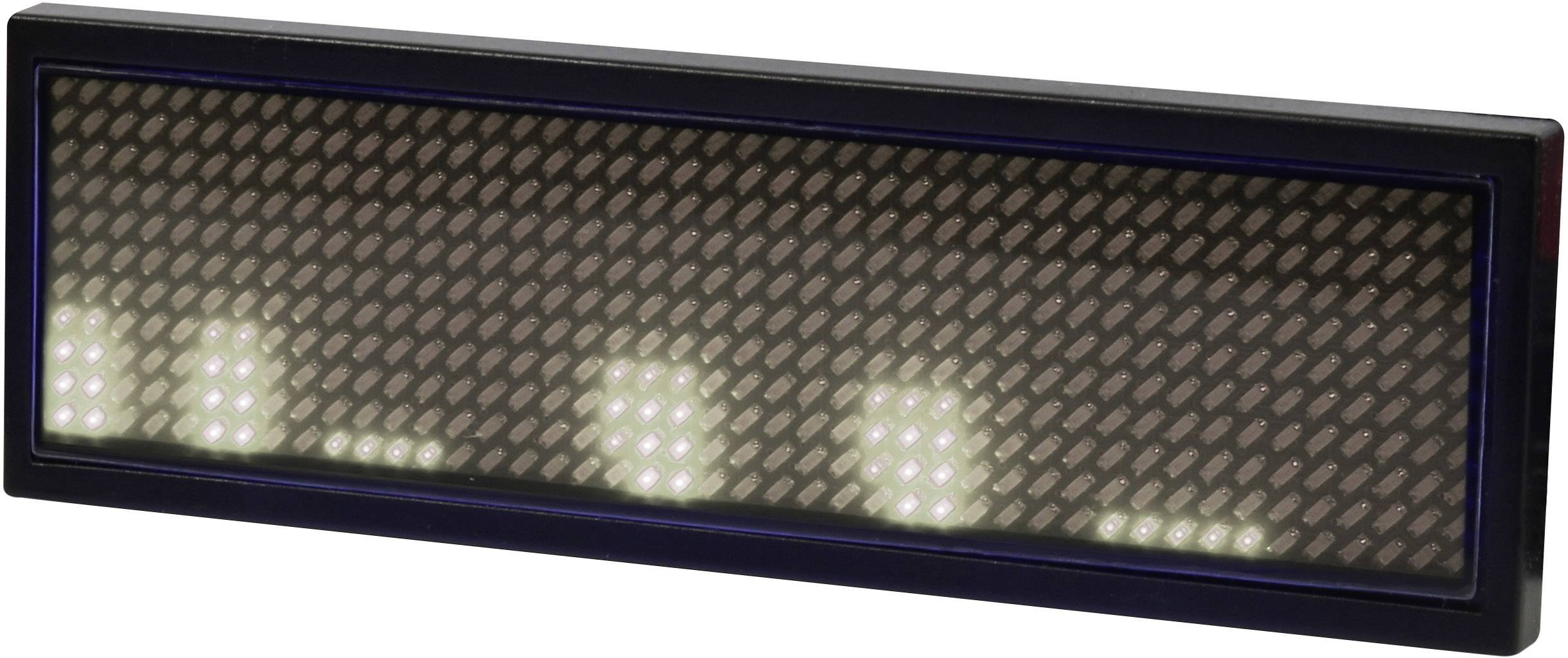 Un écran LED rectangulaire affiche des points lumineux et brillants selon un motif irrégulier sur un fond sombre.