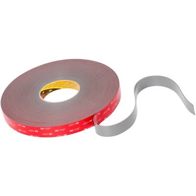 Un rouleau de ruban adhésif double face rouge de 3M, partiellement déroulé. Idéal pour une forte adhérence sur des surfaces lisses.