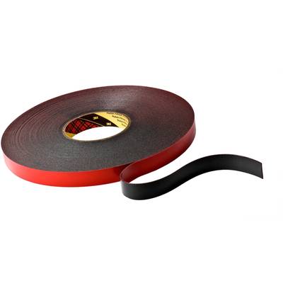 Un rouleau de ruban adhésif noir double face avec du papier de protection rouge, partiellement décollé.