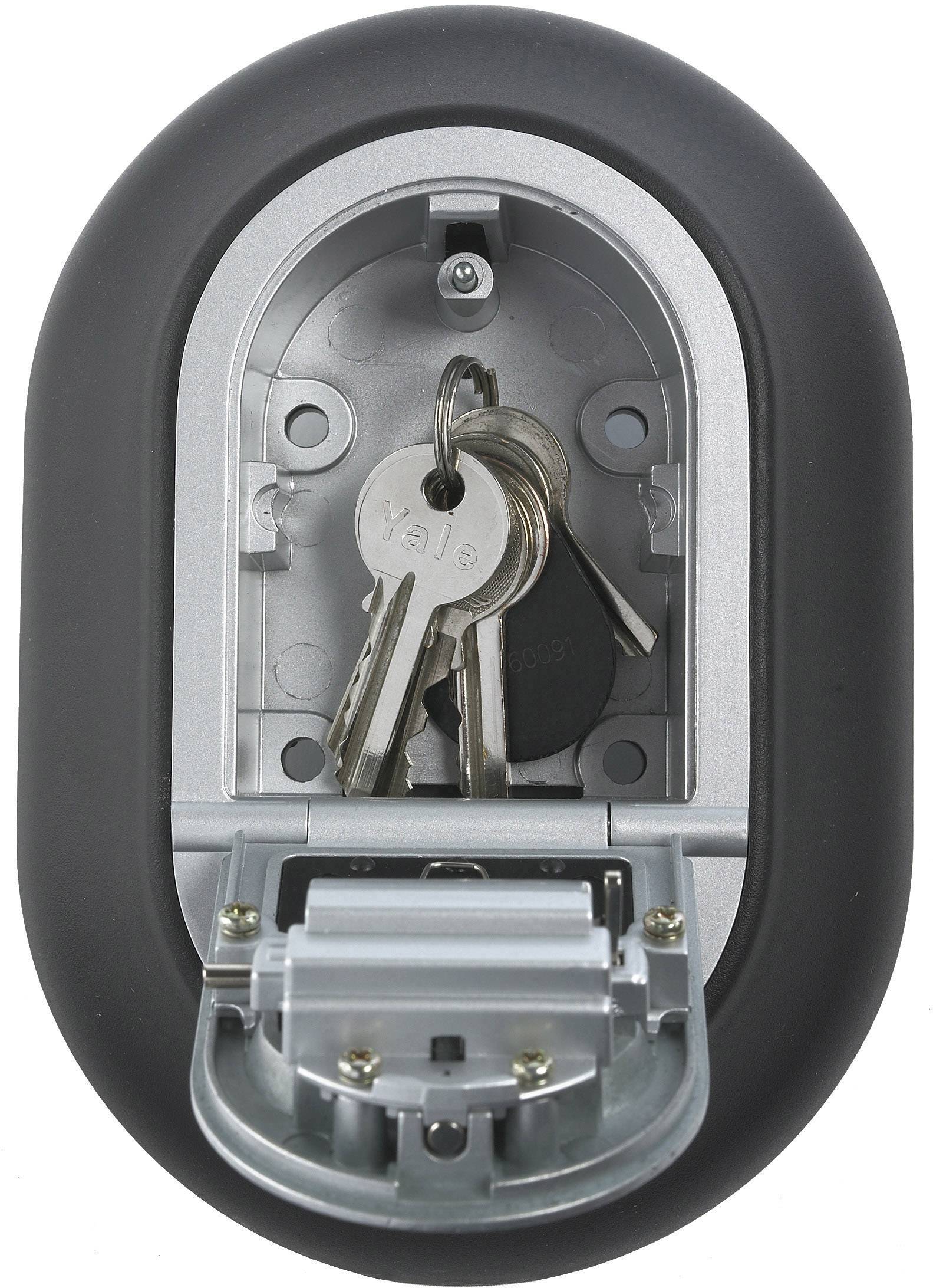 Coffre-fort à clés avec boîtier ouvert, quatre clés visibles.