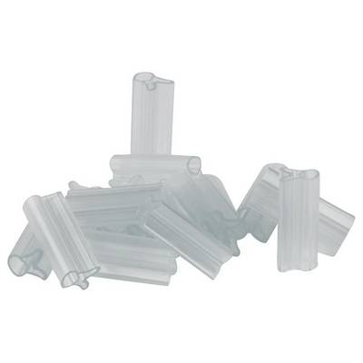 Petits tubes de plastique transparents, répartis sur une surface blanche. Ils sont ouverts et disposés selon différents angles.